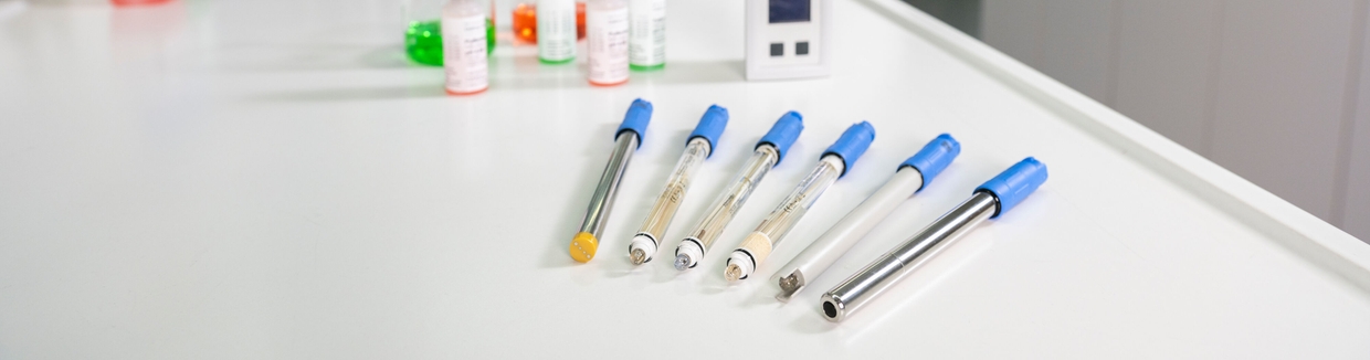 Portable pH meter with electrodes in a laboratory